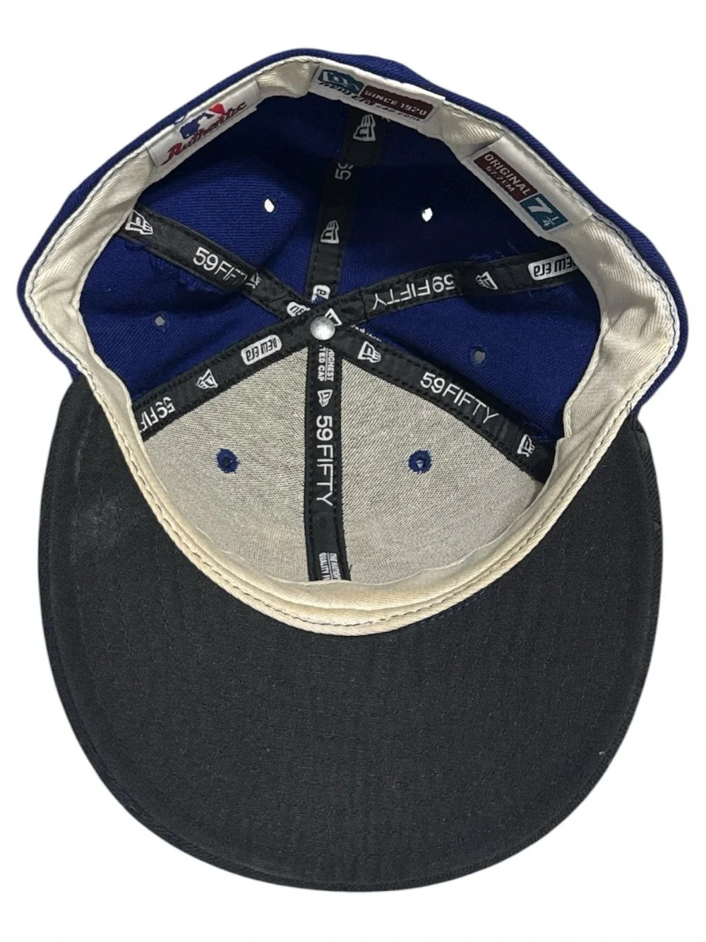 New Era Blue & Black Baseball Cap with White and Red 'T' Embroidery